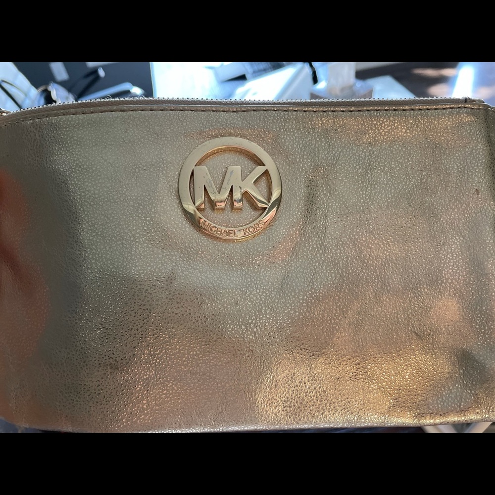 MK gold wristlet